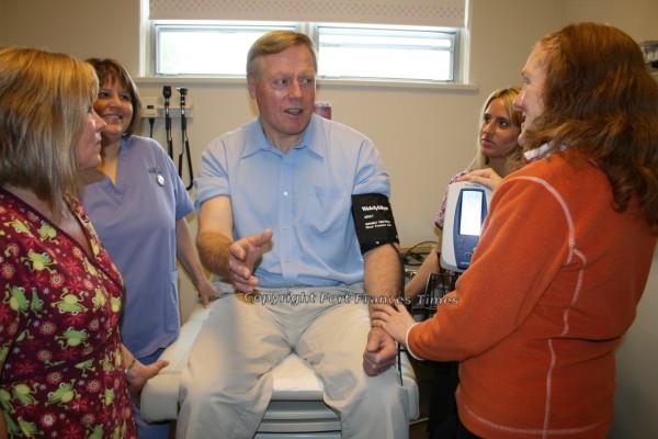 Local MPP Howard Hampton chatting with nurses