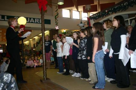 Robert Moore caroling at Rainycrest