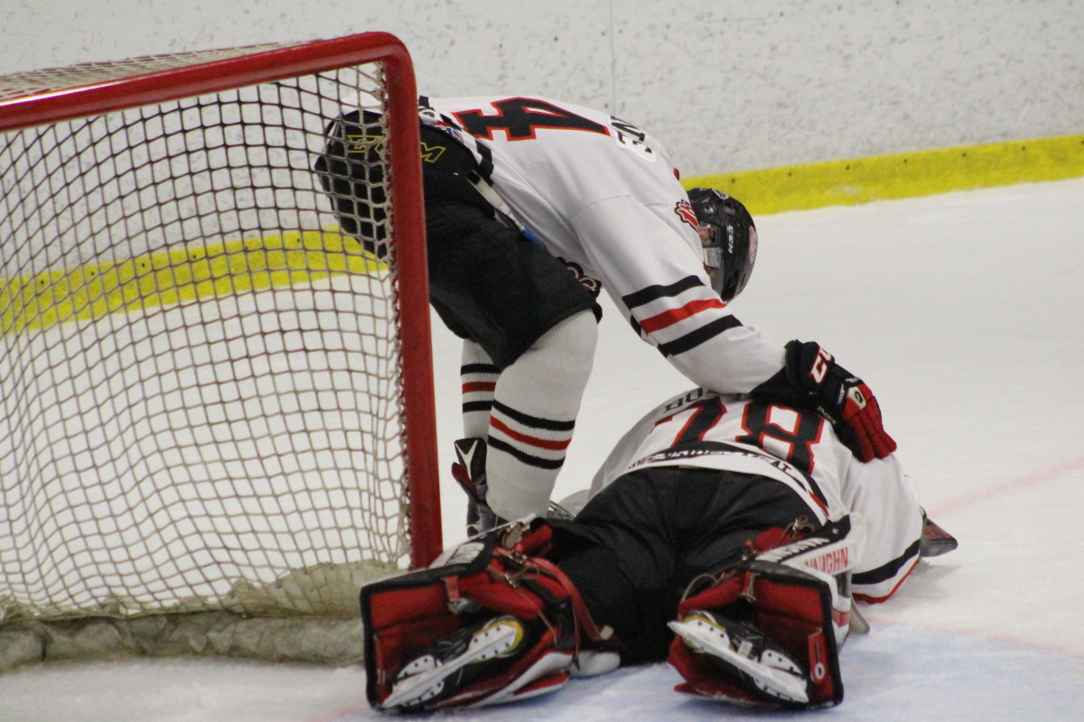 Consoling goalie