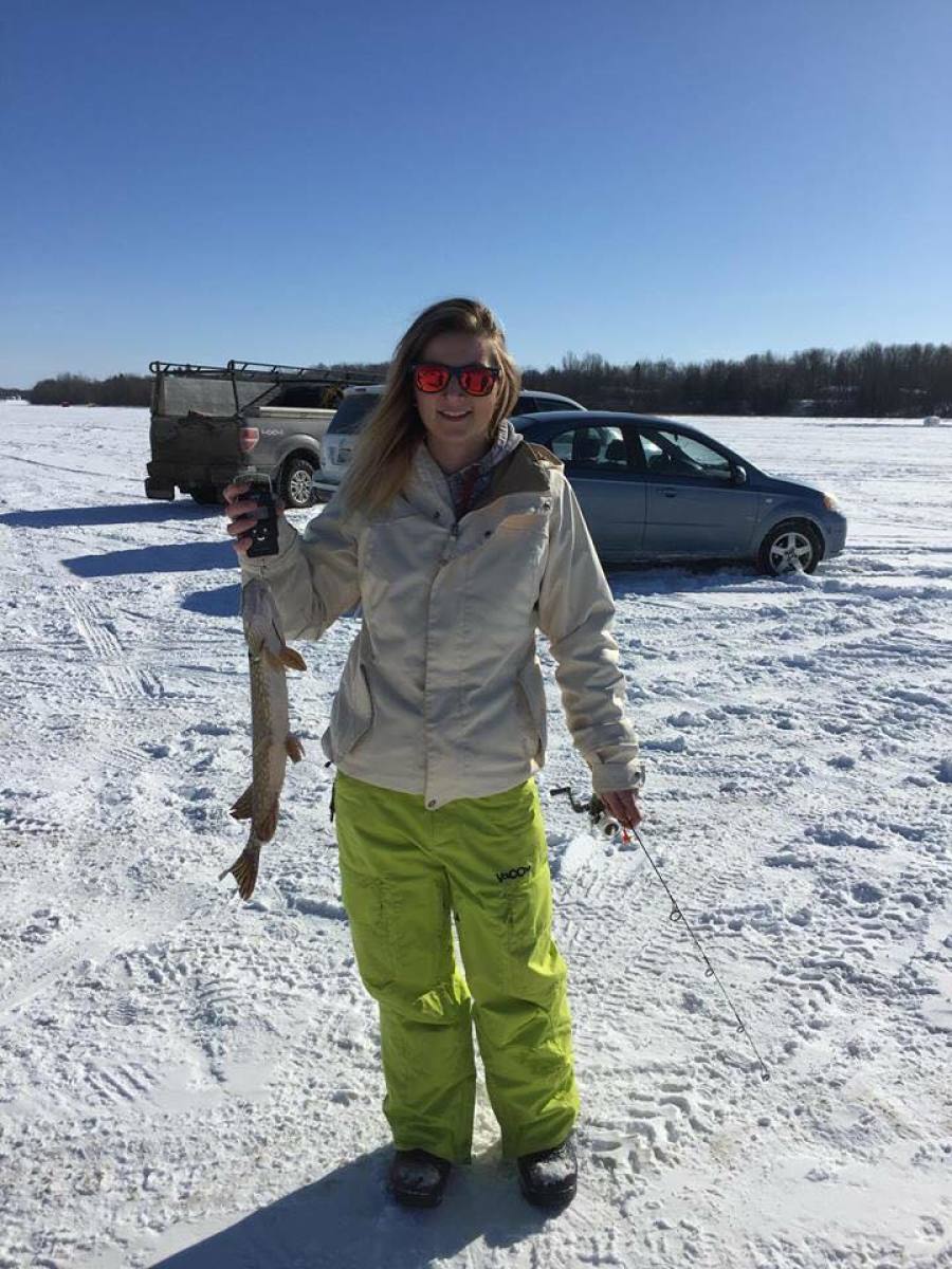 Woman holding fish