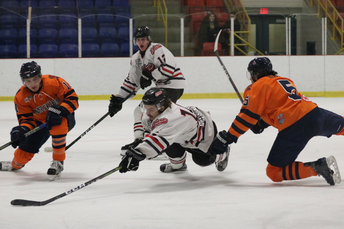 Lunging for puck