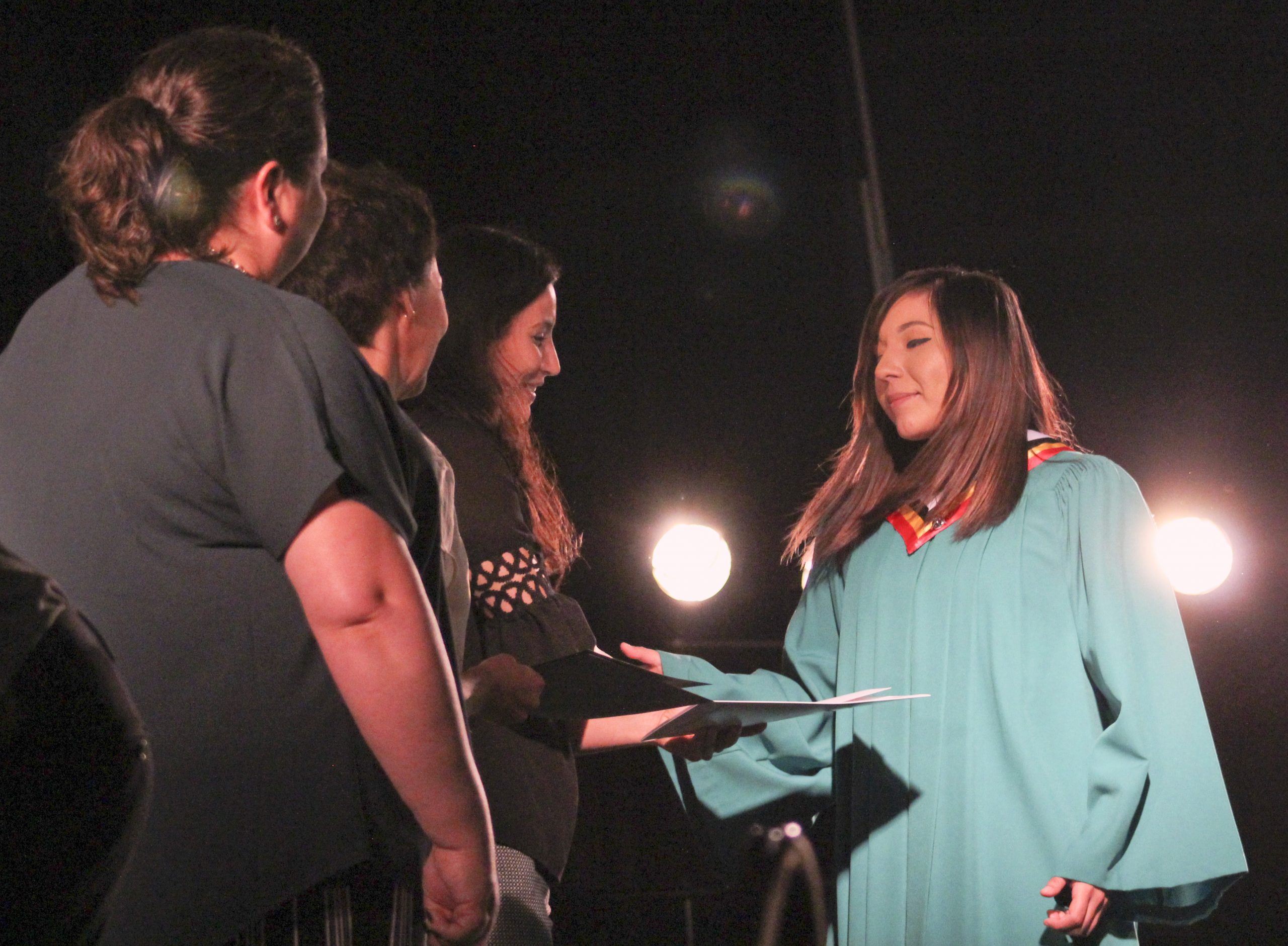 Receiving diploma