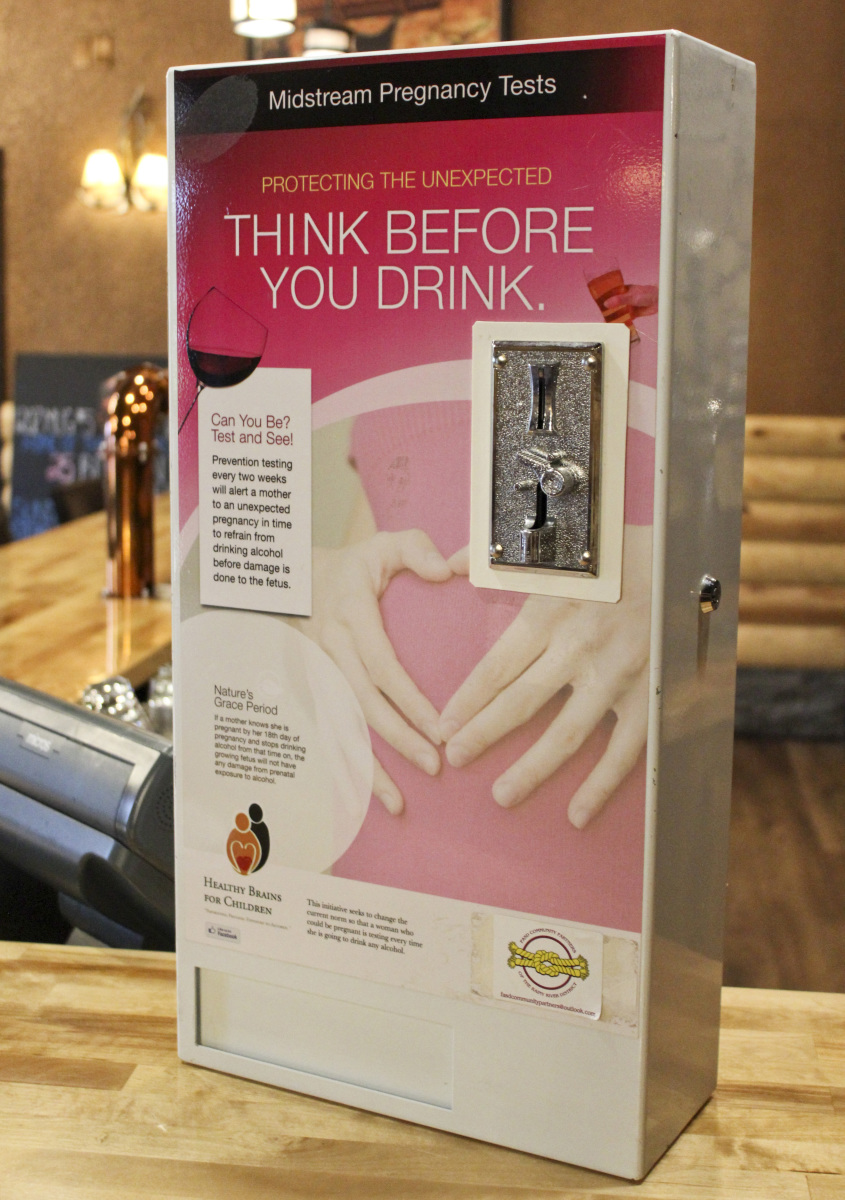Preg test dispenser