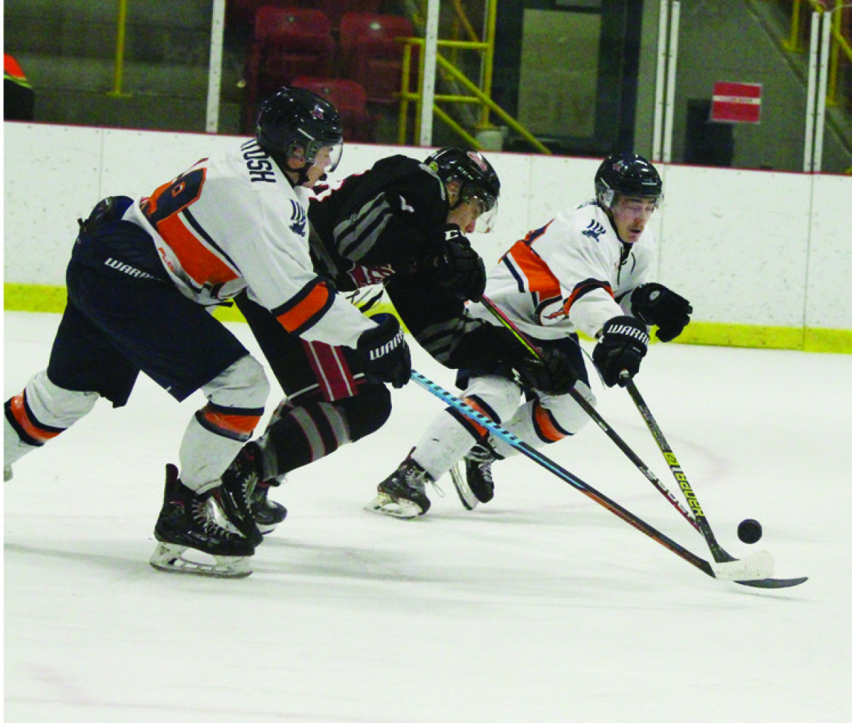 Reaching for puck