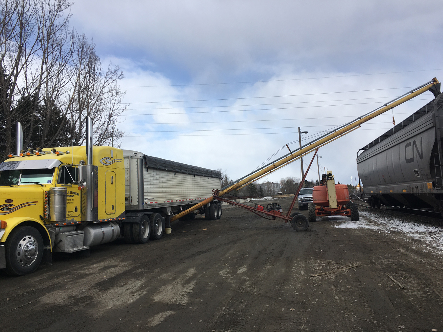 Emo business starts shipping grain by rail