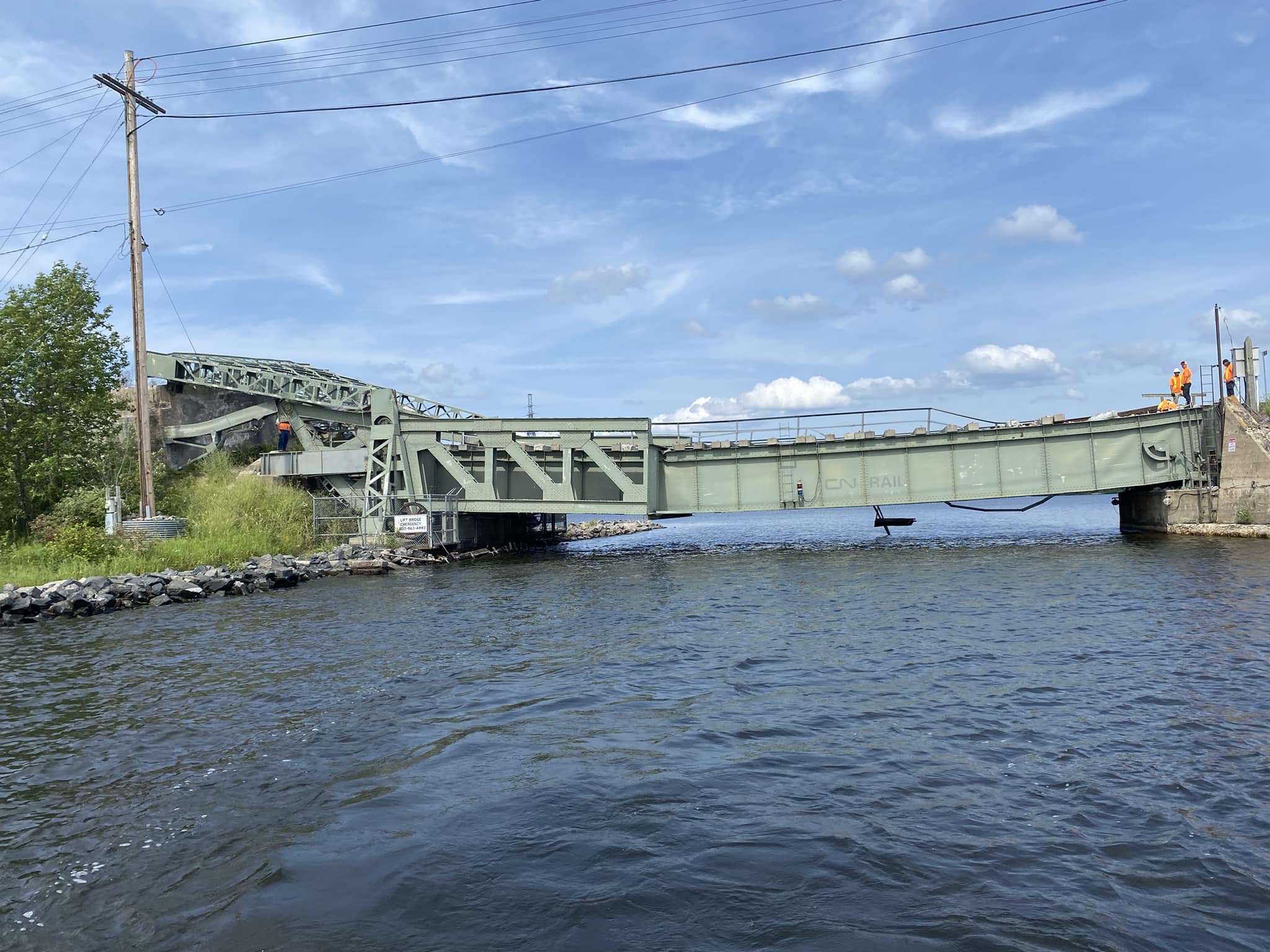 Rail bridge re-opens to trains; waterway remains closed